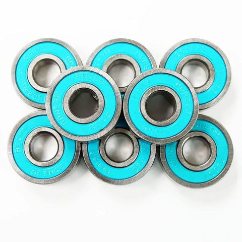 Bones Big Balls Reds skateboard bearings, 8-pack with blue shields and metal races.