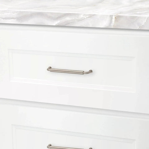 Hollywood Hills 4486 Cabinet Pull 6 Inch Center To Center Solid Brass Hardware installed on white kitchen drawer