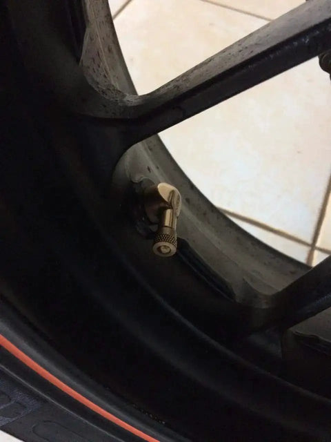 Forged Alloy Angled Valve Stem With Pre Applied Threadlocker Nut 0.357in Size Red 2 Pack Easy Inflation And Tire Pressure Check Durable Aluminum Valve Core Replacement For Standard Rim Openings installed on wheel