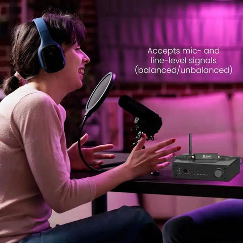 Woman using XLR Passive Isolation Transformer For Studio Home And Stage Use Eliminates Ground Loop Hum And Noise.