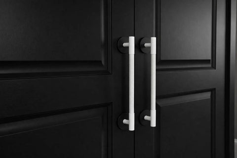 Matte Black Escutcheon Back Plates For Cabinet Knobs And Doors Four Pack Round Rosette Plate Two And One Third Inch Heavy Duty Die Cast Zinc Ideal For Bifold Closet Doors Door Pulls And Handles installed on black cabinet