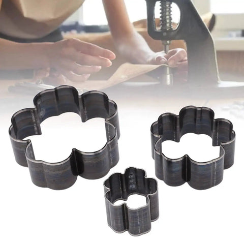 Leather Cutting Dies Set With Flower Shape Belt Hole Punches Three Piece Die Cutter Kit displayed on a crafting table