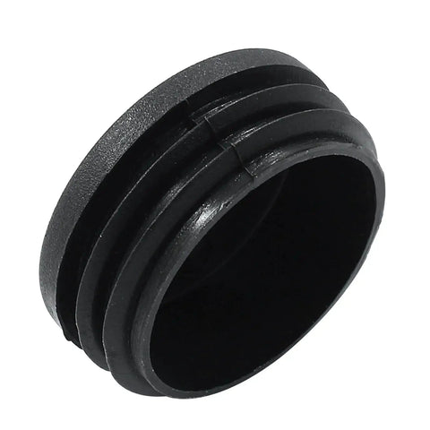 Close-up of black 45mm round plastic hole plug, part of Four Pack One And Three Quarters Inch Round Plastic Hole Plugs Black End Caps.