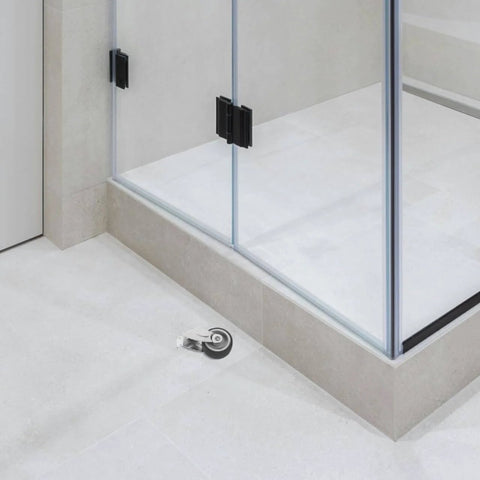Heavy Duty Sliding Barn Door Guide Roller With Screws Anti Sag Bottom Support Wheel installed on tile floor for smooth operation