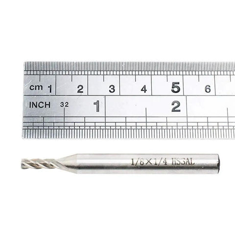 Pro Grade HSS One Eighth Inch By One Quarter Inch Straight End Mill Cutter Pack Of Two For Wood Aluminum Steel CNC Milling Router Bits With TiAlN Coating For Higher Hardness And Faster Cleaner Cuts shown with measuring ruler for scale.