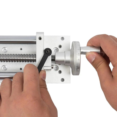 Manual Sliding Table CNC Slide With 400mm Travel Ball Screw Linear Stage For DIY Routers And Lathes in use, close-up on adjustment knob.