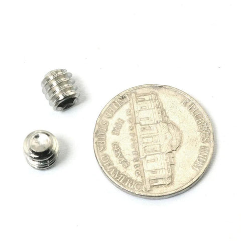 Hex Socket Set Screws 1/4-20 X 1/4 Stainless Steel 304 Cup Point Full Thread Grub Screws next to a nickel for scale.