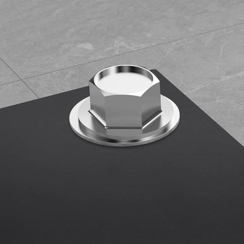 Stainless steel hex nut with flat washer on dark surface, front view.