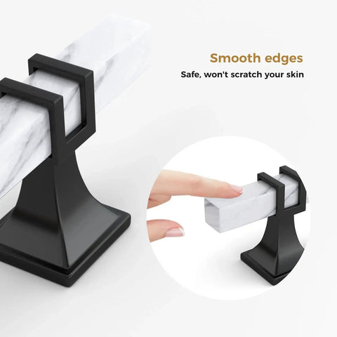 Close-up of 10 Pack 3 Inch Marble Cabinet Pulls With White Marble Grain Finish for kitchen cabinets showcasing smooth black metal holder.