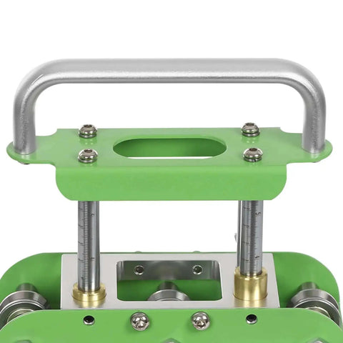 Close-up of green Versatile Sheet Metal Bender with Two-Station Edge Roller for roofing, showing handle and roller mechanism.