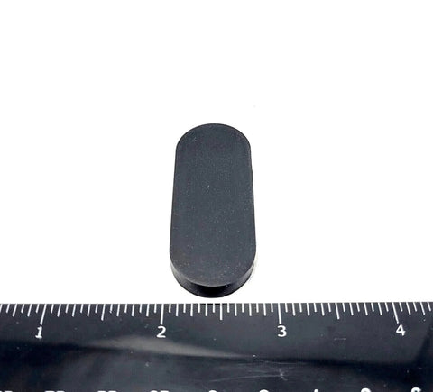 2 Inch By 3/4 Inch Oval Silicone Bumper Feet 3/16 Inch Thick With Strong Adhesive Backing viewed with ruler for scale