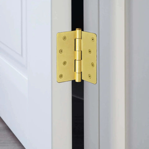 Heavy Duty Steel Door Hinges Satin Brass Finish 4 Inch Radius mounted on white interior door