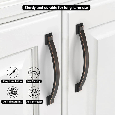 Brushed Gold Cabinet Pulls 4 Inch Hole Centers 102mm Arch Design installed on white cabinet doors