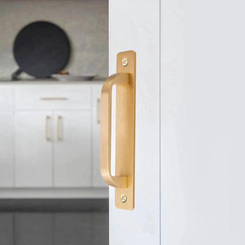 Close-up of 5-Inch Brushed Gold Cabinet Pulls With Base Plate Aluminium Alloy Square Kitchen Cabinet Handles Drawer Pulls installed on a door.