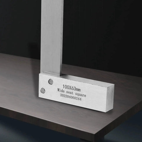 Machinist Square For Woodworking 4 X 2.5 Inch High Precision Mechanical Steel L Type Right Angle Square With Wide Seat Built To Last Heavy Duty 90 Degree Engineer Tool For Precise Framing And Marking Includes Blue Storage Box 100 X 63mm resting on a table.