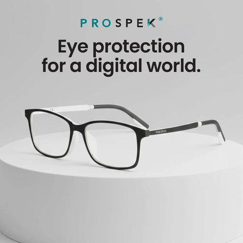 Arctic Blue Light Blocking Reading Glasses 1.5 Diopters for computer and gaming on a pedestal display with clear anti-glare lenses.