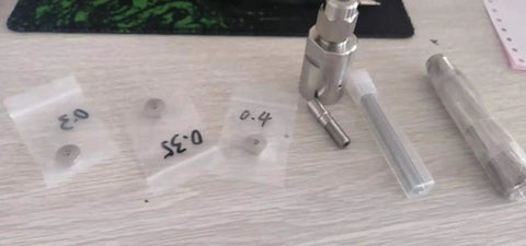 Close-up view of DIY Waterjet Cutting Head Kit with Mixing Chamber Nozzle Body Nozzle Orifice Collet for Water Jet Cutting Machine