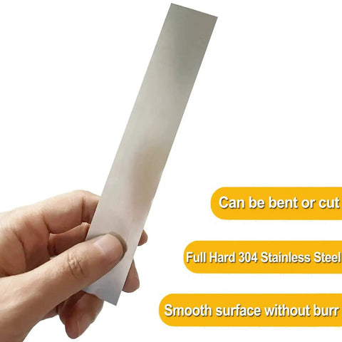 Hand holding piece from 304 Stainless Steel Pro Grade Shim Stock Set 1 Inch Wide 6 Inches Long 0.001 0.0015 0.002 Inch Thickness Three Piece Kit