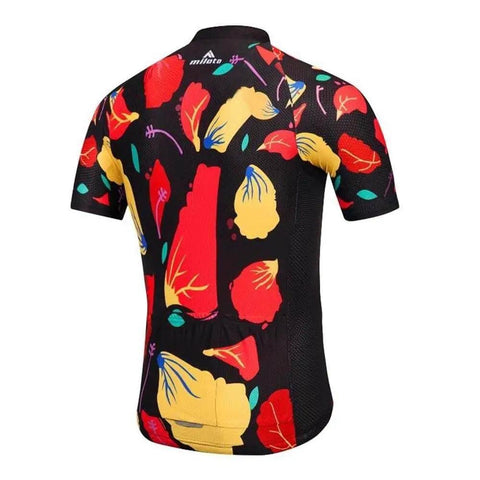 Colorful abstract patterned cycling jersey back view with black base, red and yellow designs, and brand logo.