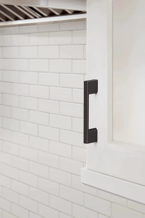 Oil Rubbed Bronze Cabinet Pull 3 Inch Center To Center 4 1/16 Inch Overall Length Cityscape Collection on white cabinet