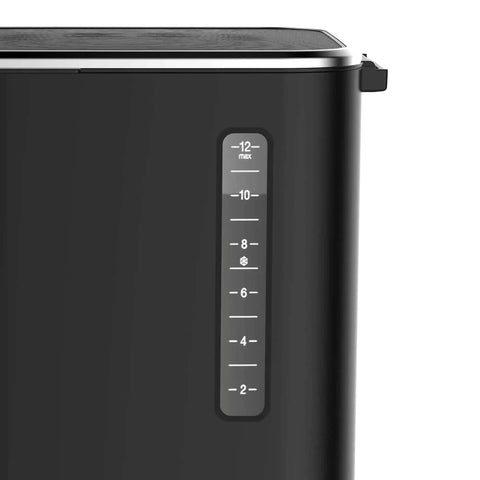 Side view of 12-Cup Touchscreen Coffee Maker With Glass Carafe, showing water level indicator for brew strength control.