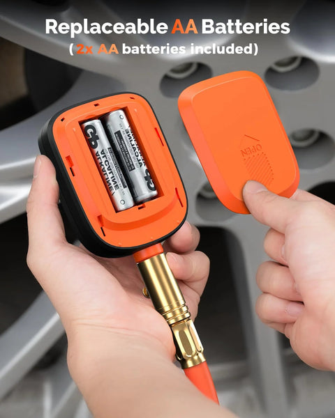 Front view of ETENWOLF T600 digital tire pressure gauge in orange housing, two AA batteries visible inside.