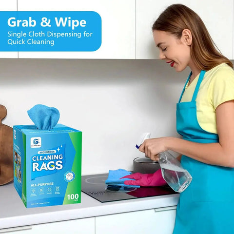 Woman using Blue Microfiber Cleaning Cloths 100 Pack 11x9 Inches Ultra Absorbent Lint Free from dispenser in kitchen.