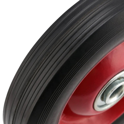 Close-up of a wheel from Four Pack 8 Inch Solid Rubber Wheels For Hand Trucks Flat Free Quiet Durable Replacement Wheels With One Half Inch Axle Hole