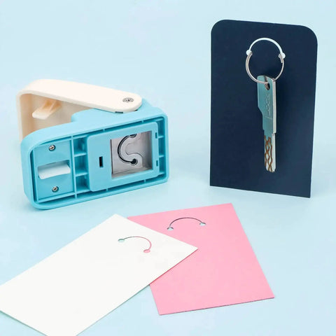 Versatile Hangtag Punch For DIY Jewelry Displays And Card Tags with cut cards, keychain display, ideal for scrapbooking, 80-500 GSM paper.