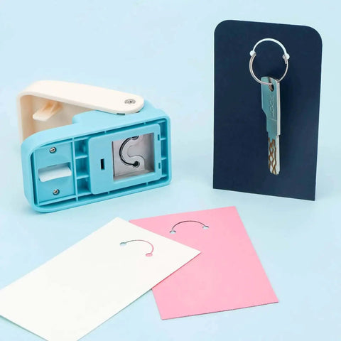 3 In 1 Hangtag Punch Kit with portable hole punch and rounded corner cutter, displaying punched cards and keychain demo.