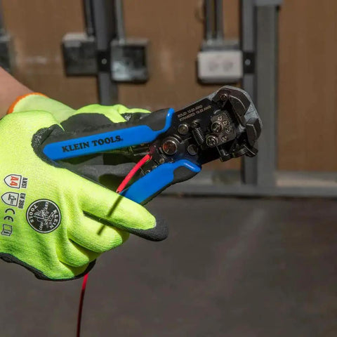 Using Self-Adjusting Wire Stripper And Cutter, Heavy Duty, Cuts And Strips 10-20 AWG Solid And 12-22 AWG Stranded on jobsite