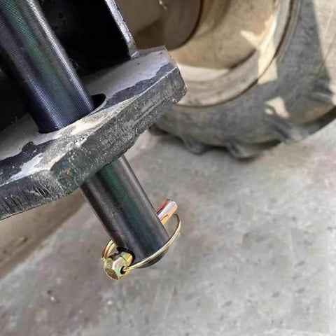 Six Piece Lynch Pin Kit With Ring Heavy Duty Seven Sixteenth Inch By One Three Quarter Inch Pins installed on tractor