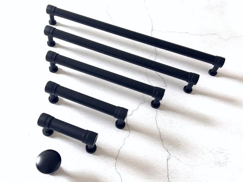 Matte Black Cabinet Pull Handle 2.75 Inch Centers 70 Mm Center to Center Drawer Knob Pull for Kitchen Cabinets Dresser Pulls Hardware Includes 1 Inch Screws Easy Mount DIY Friendly Durable Metal Finish, varying sizes shown on white background