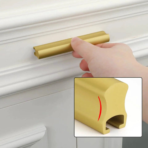 Six Pack Adjustable Matte Gold Drawer Pulls For Cabinets And Furniture shown in use on white drawer