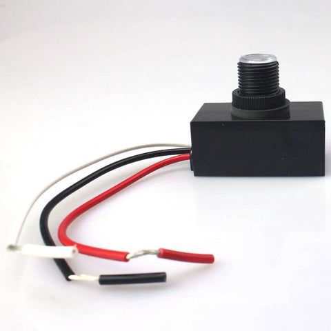 Outdoor Dusk To Dawn Sensor Switch for Lamps and Post Lights with weatherproof plastic casing and copper conductor, side view