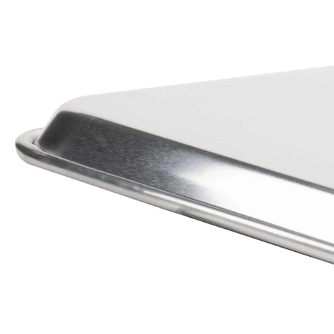 Close-up of Commercial Grade Aluminum Sheet Pan With Large Flat Baking Surface Two Thirds Size 18 Gauge Reinforced Rim Closed Bead