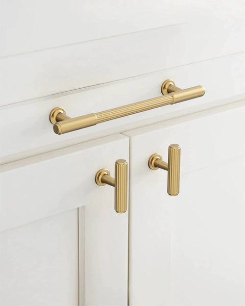 Champagne Bronze Cabinet Pulls 10 Pack 5 Inch Center To Center 6.6 Inch Overall Length installed on white cabinets