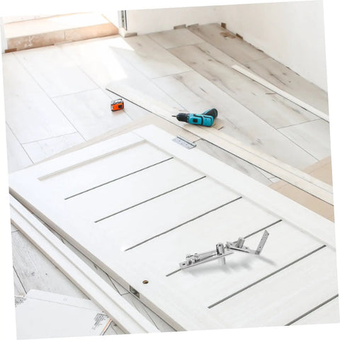Heavy Duty Pivot Hinge Kit For Doors And Cabinets Concealed Hidden Hinge System For DIY Secret Door Projects Crossed Pivot Concealed Hinge With Hardware Included shown during door installation in a room.