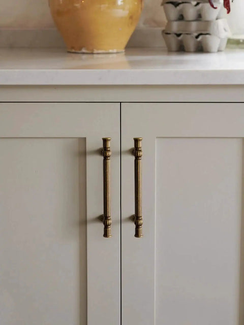 Antique Brass Cabinet Pulls With Three And Three Quarters Inch Hole Centers Zinc Alloy Classic Vintage Drawer Handles installed on cabinet