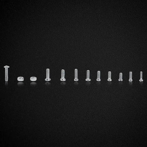 Close-up view of 600Pcs Tiny But Mighty Multipurpose Screw Assortment Kit with M1 to M1.6 mini screws and nuts on black background.