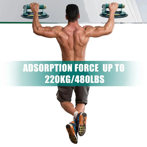 Back view of a person using heavy duty 8 inch glass suction cups for lifting large glass max load 960 lbs, supporting body weight.