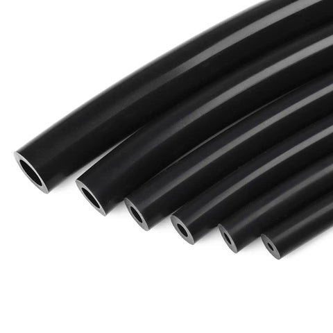 Various sizes of black hoses from Go-To Silicone Vacuum Hose Kit 6 Pack With 5ft Tubing In 1/8 To 3/8 Inch Diameters And 113 Nylon Connectors.