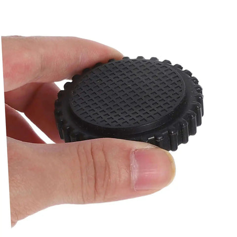 Close-up of a hand holding a single piece from 4 Pcs Grippy No Slip Rubber Feet With Threaded Base For Food Scales And Industrial Platforms