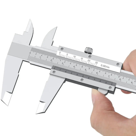 Hand holding Vernier Caliper 6 Inch Non Digital With Stainless Steel Feeler Gauge 32 Blades High Precision 0-6 Inches 0-150 Mm Accurate To 0.02 Mm 0.001 Inch Inside Outside Step Depth Measuring Tool For Machinists DIY Enthusiasts