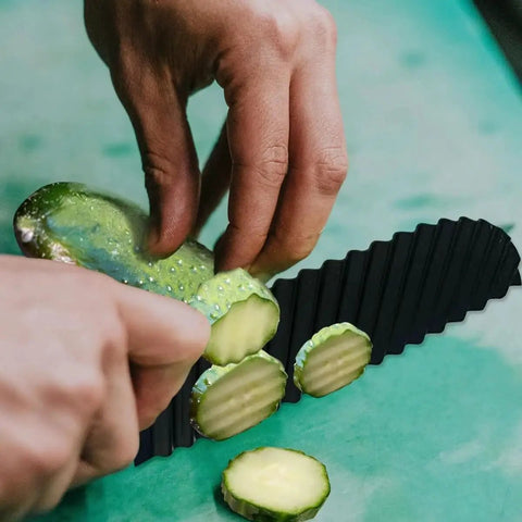 Crinkle Cutter For Potatoes And Veggies cutting cucumber slices, showcasing premium stainless steel wave fry cutter for kitchen use.