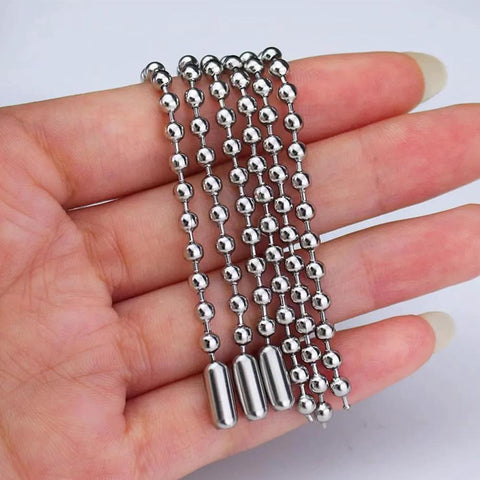 Hand holding 5 Meter Beaded Stainless Steel Roller Blind Chain With 12 Connectors Ball Chain Extender For Roller Blinds And Extensions