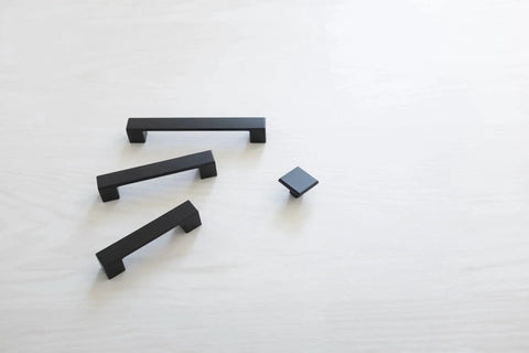 10 Pack Matte Black Kitchen Cabinet Handles Low Profile Drawer Pulls in modern square design on light surface
