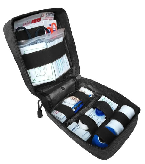 Opened First Aid Kit IFAK Pouch With MOLLE Tactical Med Bag for EMT and Emergency Trauma Care showing elastic holders and contents.