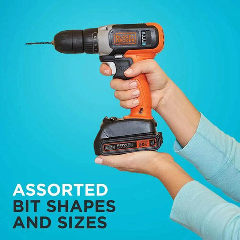 Person holding an orange and black drill with the Do It All 46-Piece Drill And Screwdriver Bit Set For Home Projects, Black Decker.