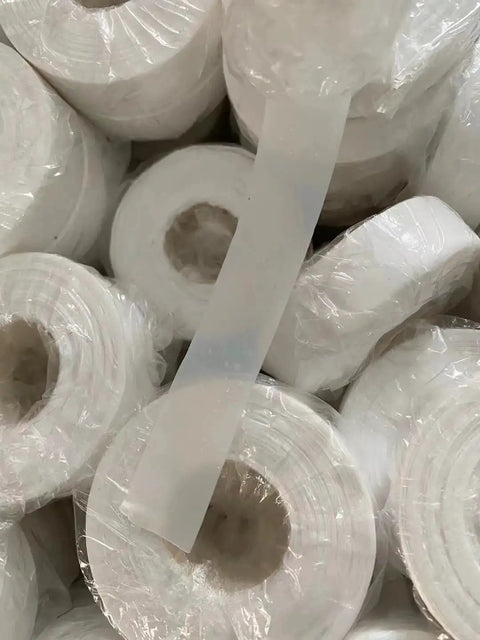 Close-up of Oily PTFE Thread Seal Tape For Natural Gas Piping 5 Rolls 20mm By 0.2mm High Temp Resistance Up To 260C